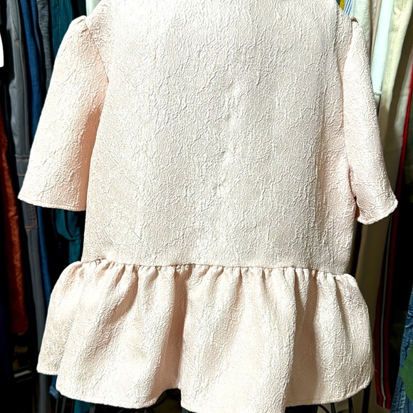 DIVIDED Elegant Pink Textured Top With Ruffled Bottom - Picture 4 of 4